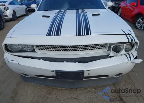 2013 Dodge Challenger Sxt z USA, uszkodzony, nr VIN 2C3CDYAG9DH704666